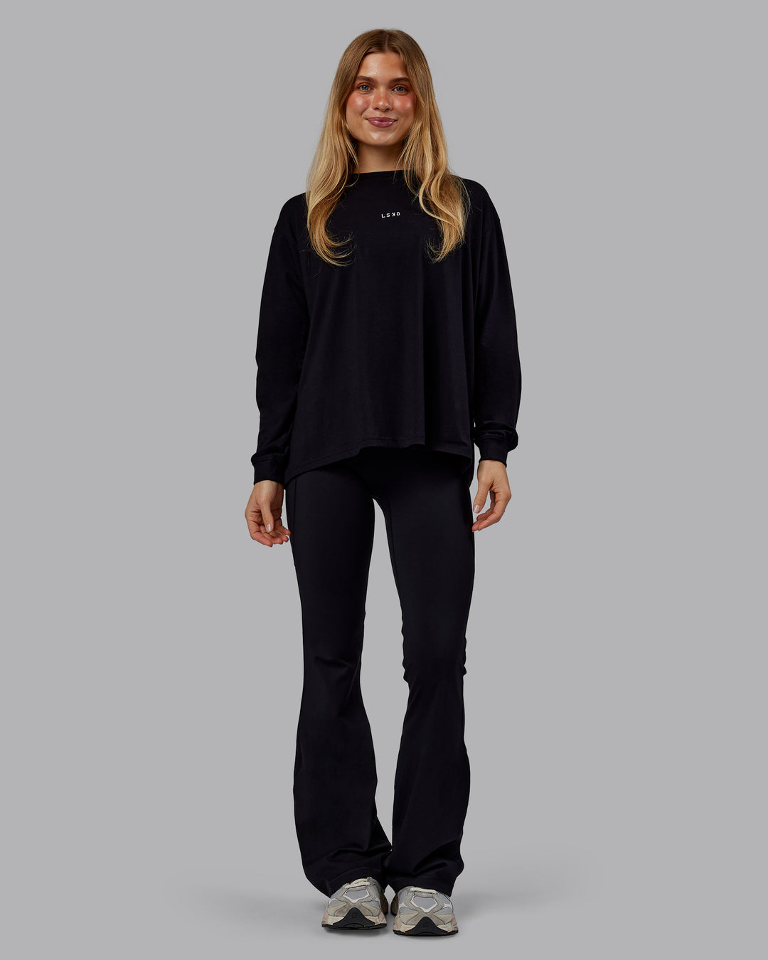 Woman wearing Go-To Long Sleeve FLXCotton Oversized Tee - Black-White | Model:Emilie | Size:S