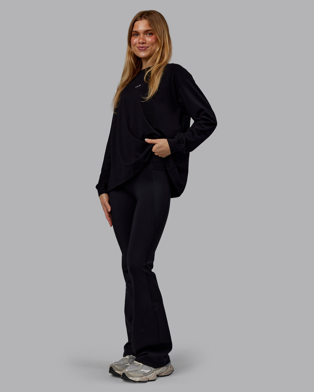 Woman wearing Go-To Long Sleeve FLXCotton Oversized Tee - Black-White | Model:Emilie | Size:S