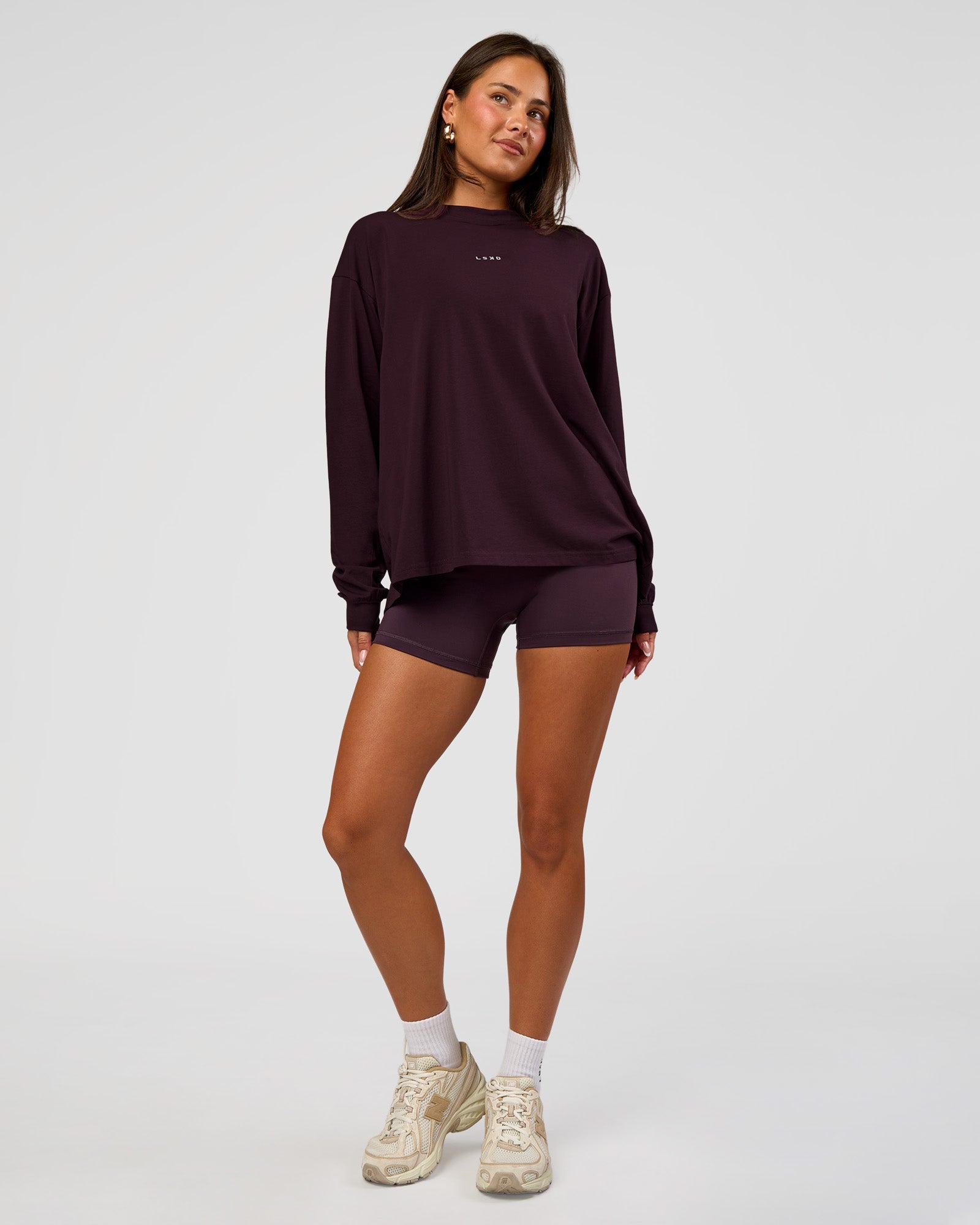 Woman wearing Go-To Long Sleeve FLXCotton Oversized Tee - Midnight Plum-White | Model:Bianca | Size:S