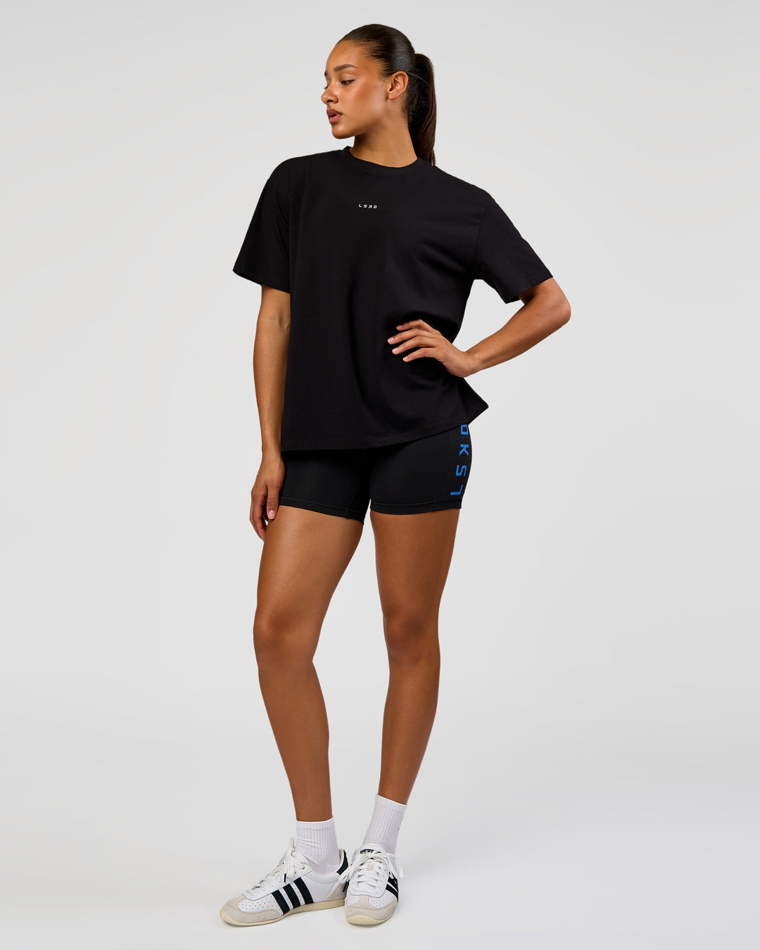Woman wearing Go-To Love The Process FLXCotton Tee - Black-Palace Blue | Model:Rosie | Size:S