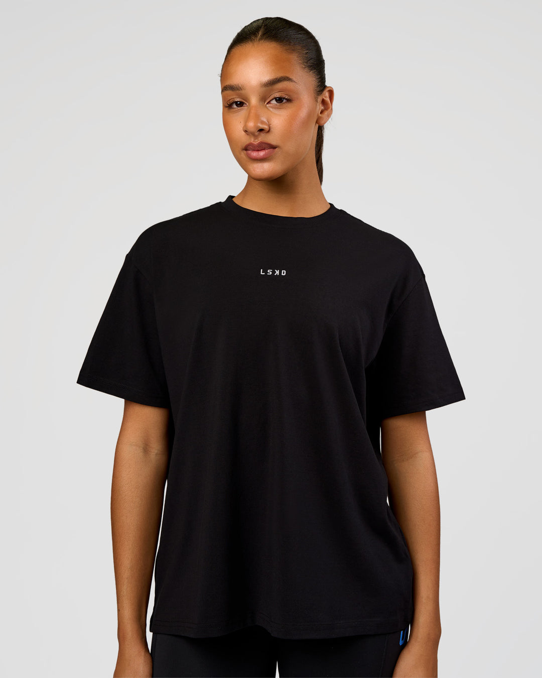 Woman wearing Go-To Love The Process FLXCotton Tee - Black-Palace Blue | Model:Rosie | Size:S