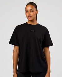 Woman wearing Go-To Love The Process FLXCotton Tee - Black-Palace Blue | Model:Rosie | Size:S