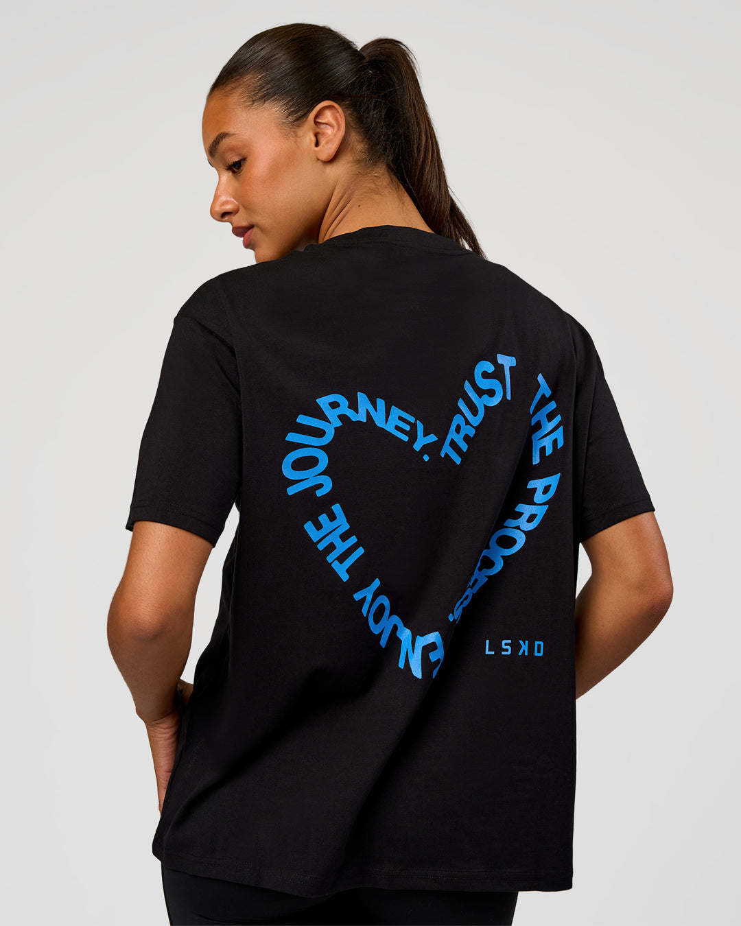Woman wearing Go-To Love The Process FLXCotton Tee - Black-Palace Blue | Model:Rosie | Size:S