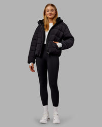 Woman wearing Go-To Puffer Jacket - Black | Model:Ella | Size:S
