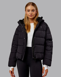 Woman wearing Go-To Puffer Jacket - Black | Model:Ella | Size:S