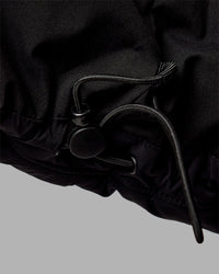 Woman wearing Go-To Puffer Vest - Black | Model:Ella | Size:S