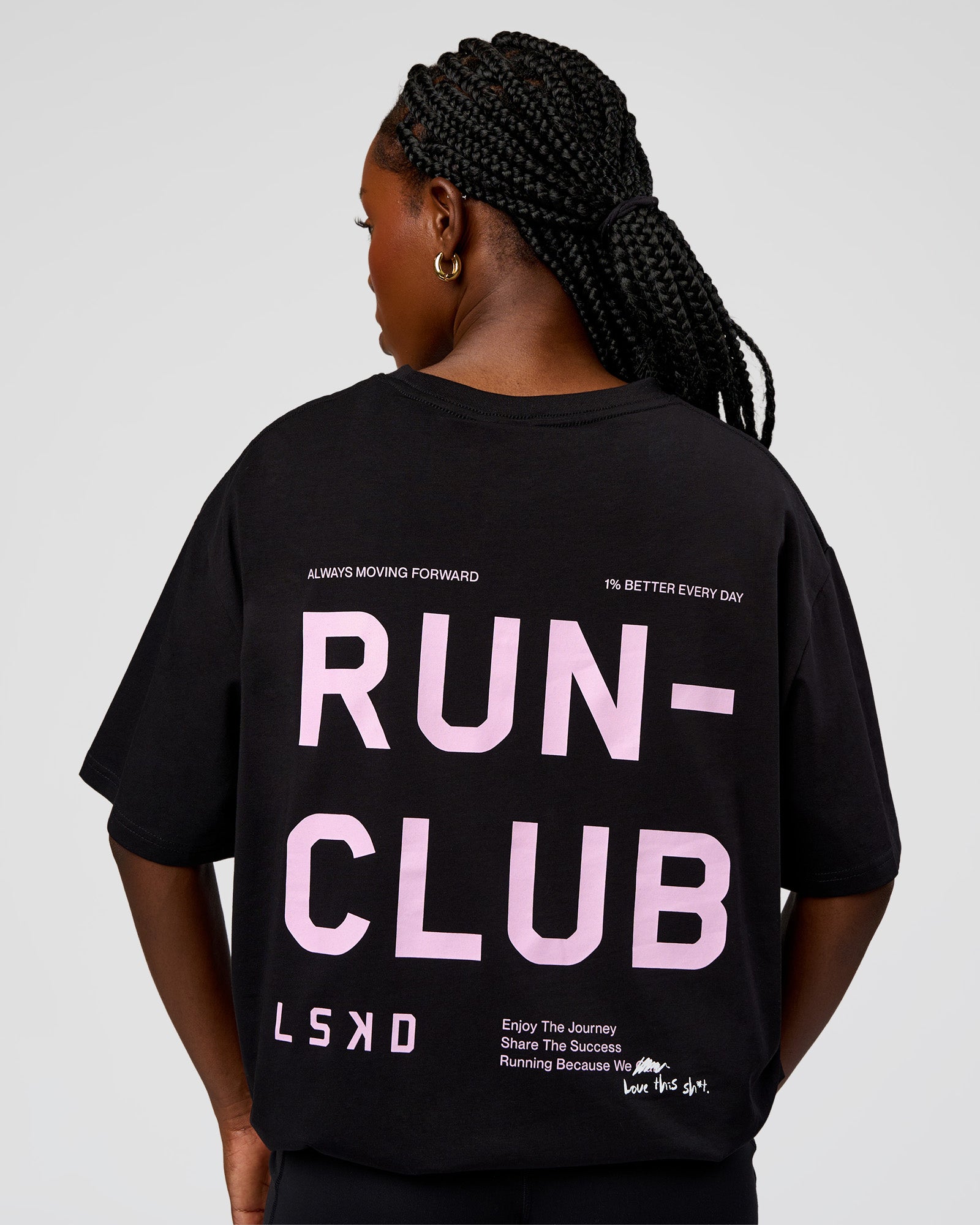 Woman wearing Go-To Run Club FLXCotton Oversized Tee - Black-Marshmallow | Model:Ellie | Size:S