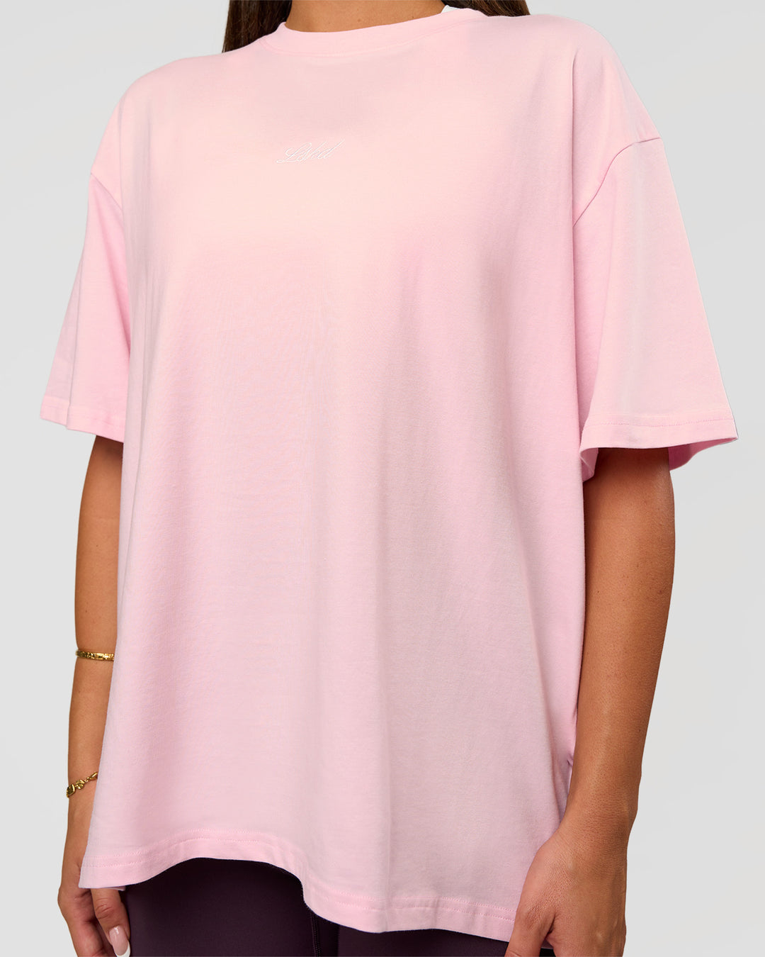 Woman wearing Go-To FLXCotton Oversized Tee - Marshmallow-White | Model:Bianca | Size:S