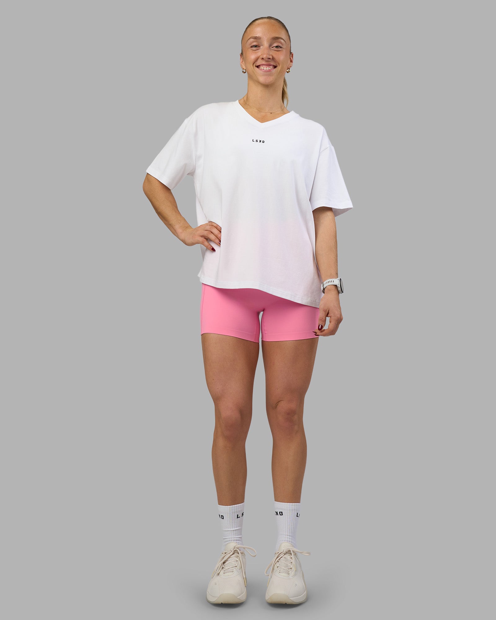 Woman wearing Go-To V-Neck FLXCotton Oversized Tee - White-Black | Model:Bronte | Size:S