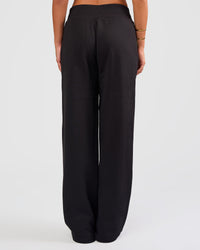Woman wearing Go-To Wide Leg Track Pant - Black | Model:Bianca | Size:S