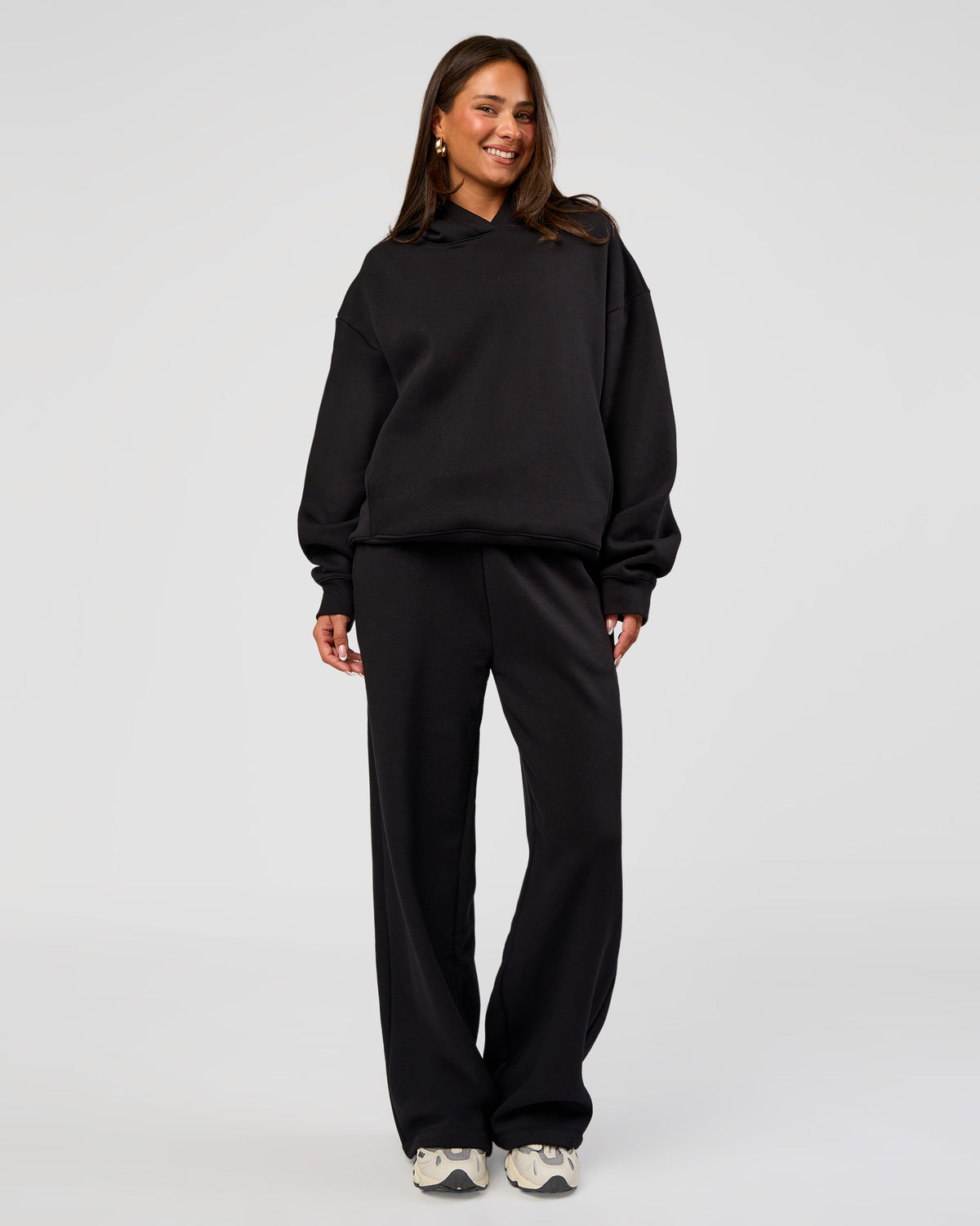 Woman wearing Go-To Wide Leg Track Pant - Black | Model:Bianca | Size:S