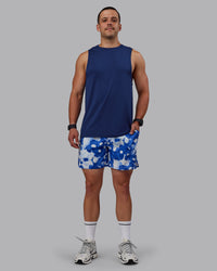 Man wearing Grand Slam 6" Shorts in Wildflower Midnight Blue | Size:S