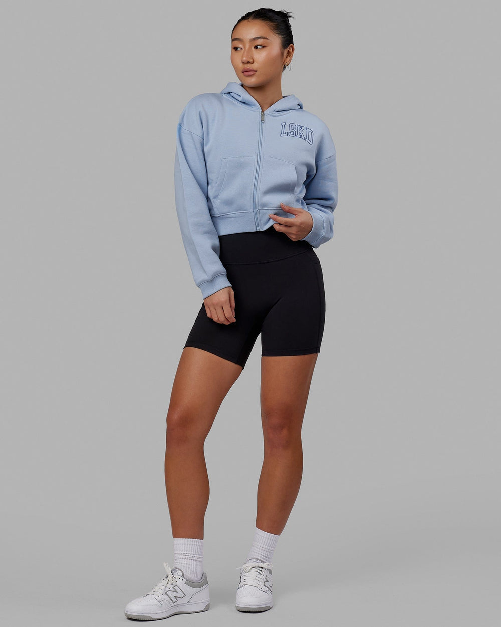 Woman wearing Guild Cropped Hoodie - Windsurfer-Power Cobalt