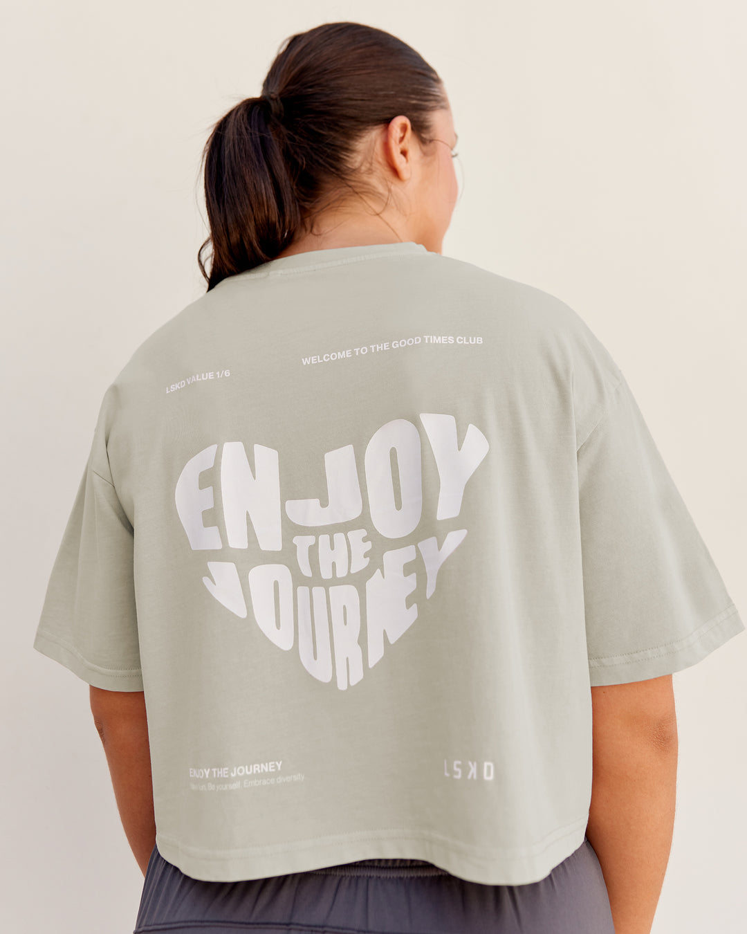 Woman wearing Heart Washed FLX Cotton Cropped Tee- Washed Shale Beige-White