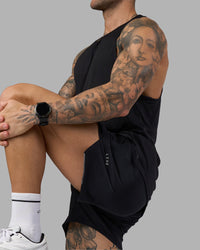 Man wearing Hybrid 5" Short - Black-Reflective | Model:Tommy | Size:S