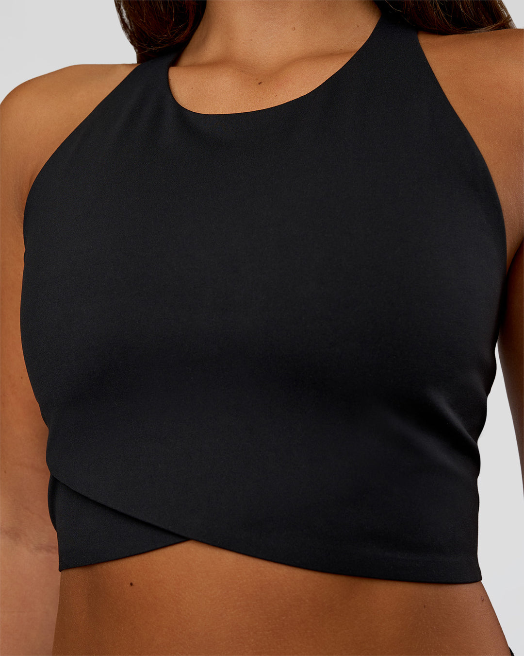 Woman wearing Hybrid Performance Crossover Tank - Black | Model:Bianca | Size:S