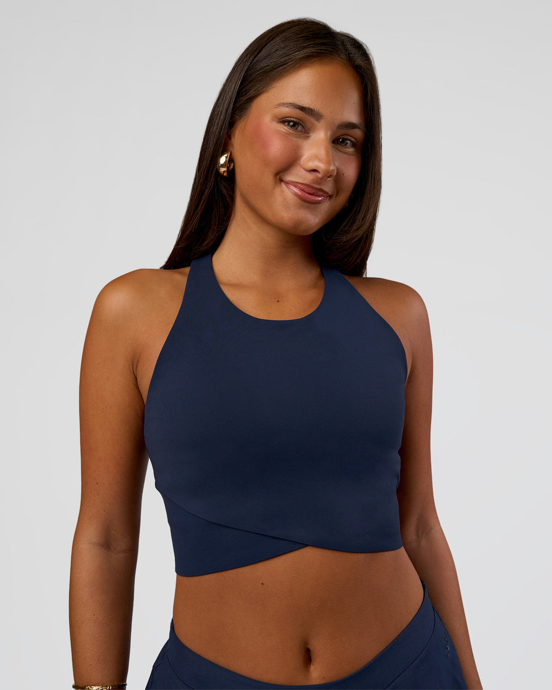 Woman wearing Hybrid Performance Crossover Tank - Future Navy | Model:Bianca | Size:S