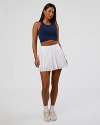 Woman wearing Hybrid Performance Crossover Tank - Future Navy | Model:Bianca | Size:S