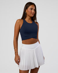 Woman wearing Hybrid Performance Crossover Tank - Future Navy | Model:Bianca | Size:S