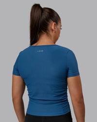 Woman wearing Ignite Ribbed Scrunch Side Cropped Tee - Indigo | Size:S | Model:Tylah