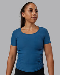 Woman wearing Ignite Ribbed Scrunch Side Cropped Tee - Indigo | Size:S | Model:Tylah