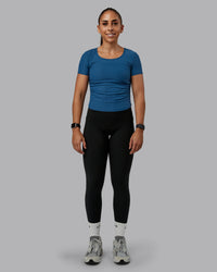 Woman wearing Ignite Ribbed Scrunch Side Cropped Tee - Indigo | Size:S | Model:Tylah