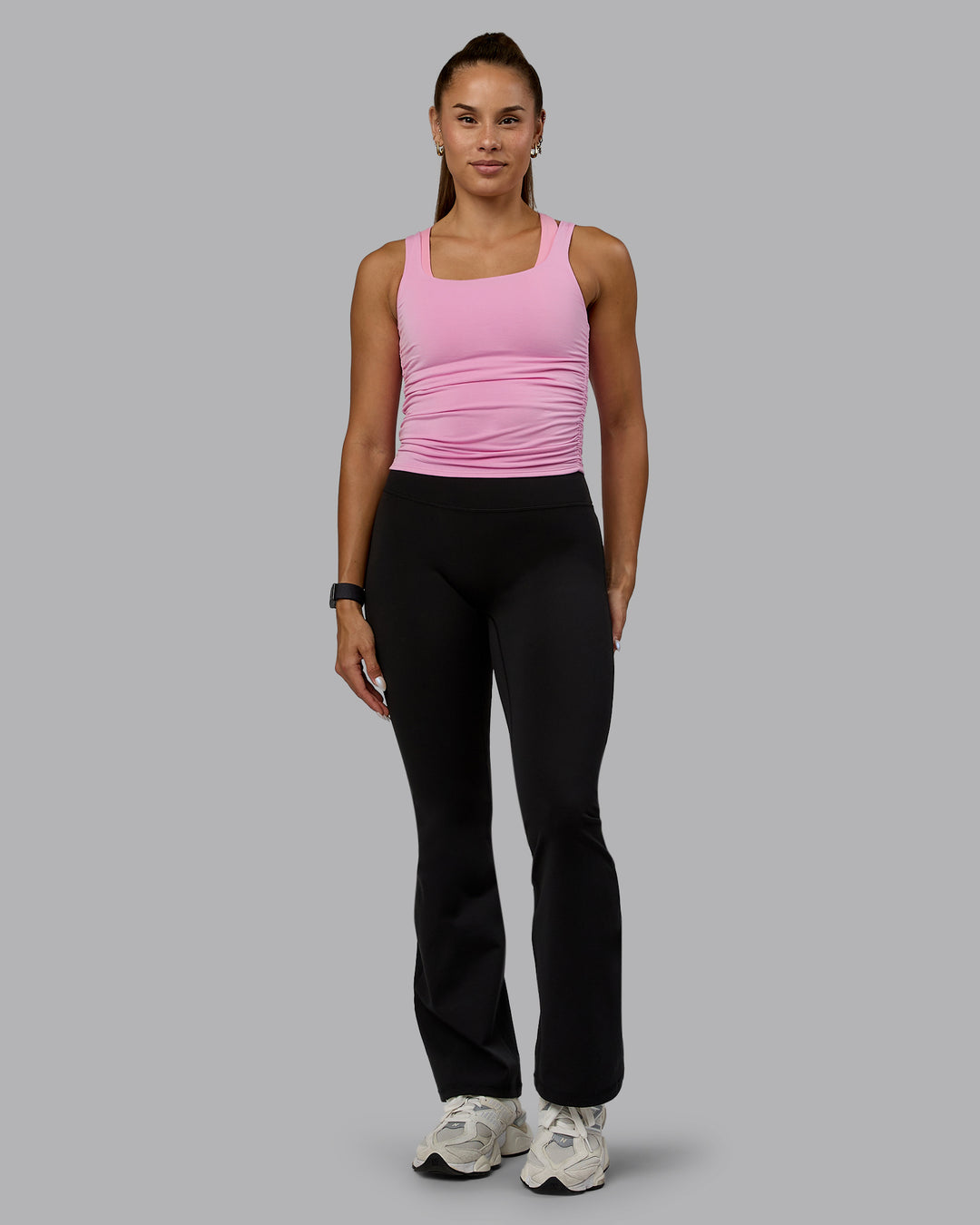 Woman wearing Ignite Scrunch Side Tank - Bubblegum