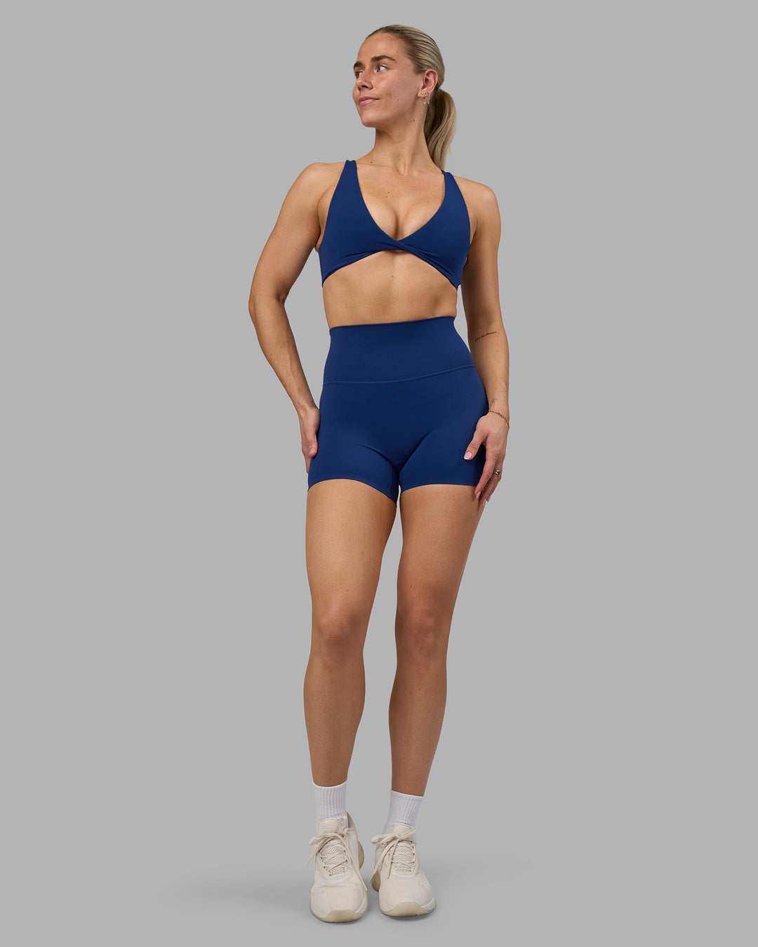 Woman wearing Impulse Reversible Sports Bra - Midnight Blue | Model:Hannah | Size:S - view 7