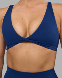Woman wearing Impulse Reversible Sports Bra - Midnight Blue | Model:Hannah | Size:S | Thumbnail Index: 9