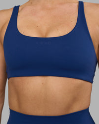 Woman wearing Impulse Reversible Sports Bra - Midnight Blue | Model:Hannah | Size:S | Thumbnail Index: 10