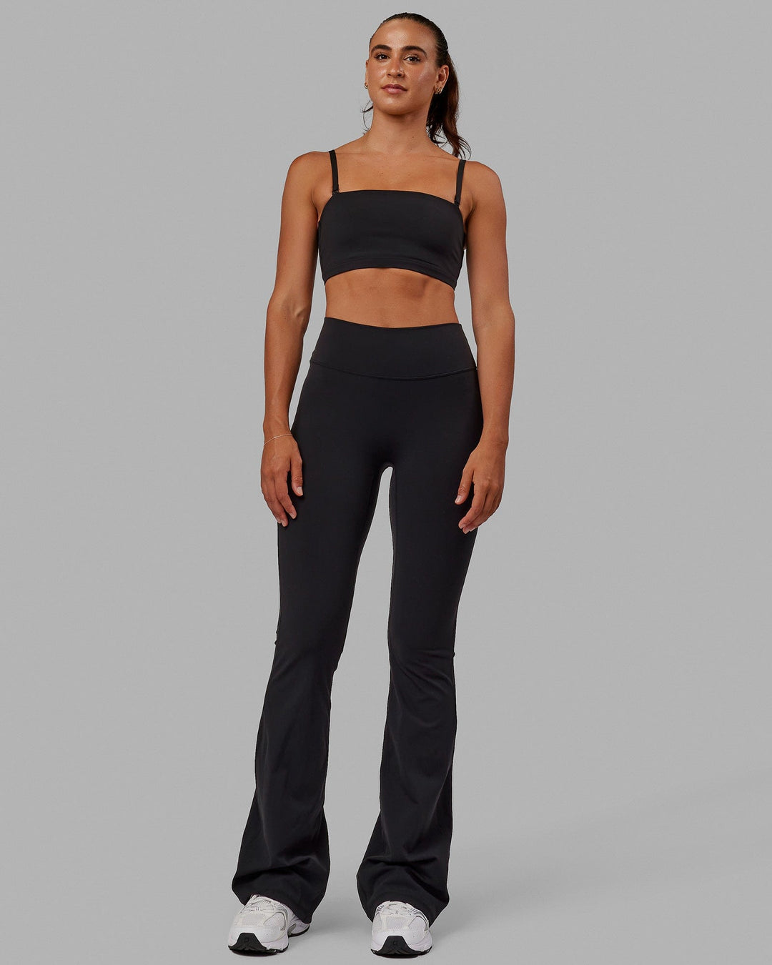 Woman wearing Inspire Sports Bra - Black