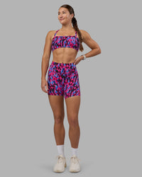 Woman wearing Inspired Sports Bra - Pink Luminous | Model:Hannah | Size:S