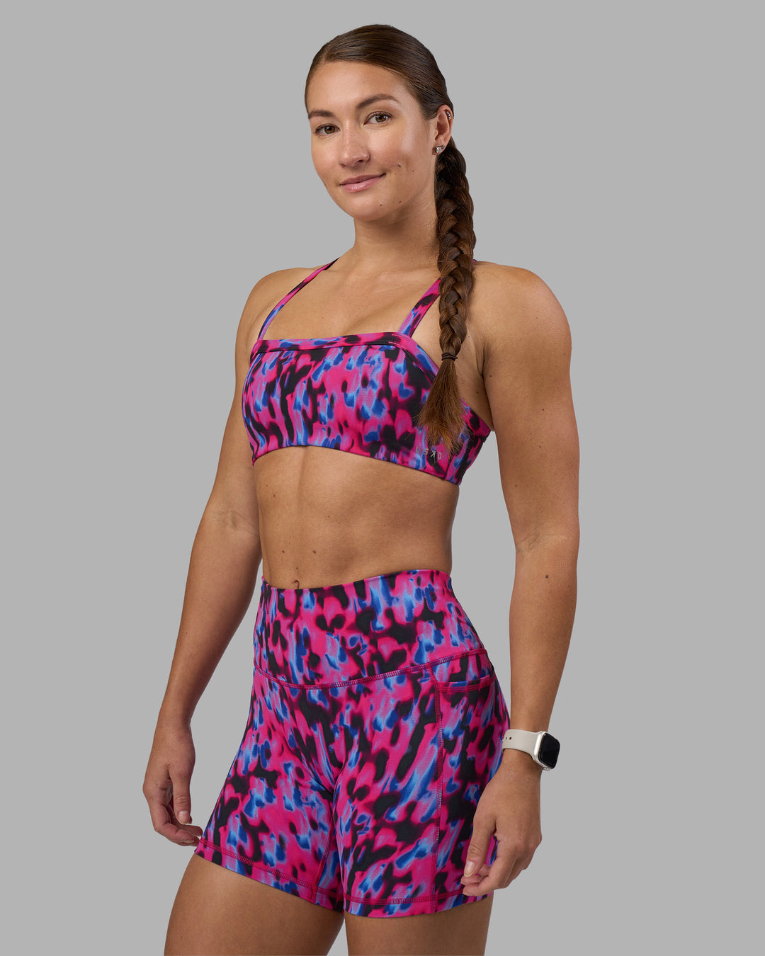 Woman wearing Inspired Sports Bra - Pink Luminous | Model:Hannah | Size:S