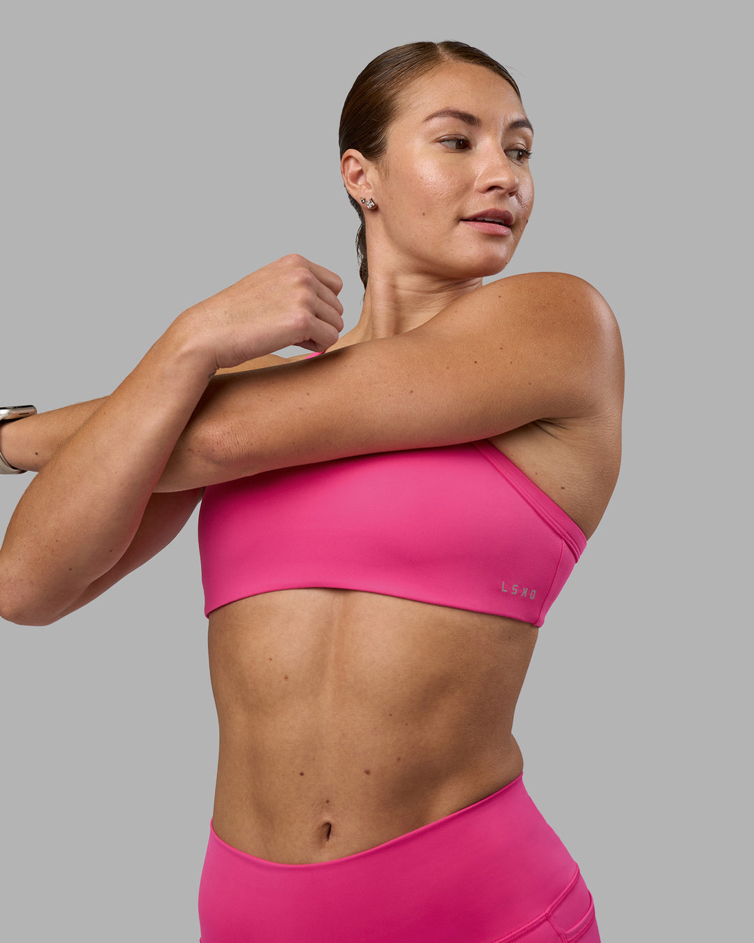 Woman wearing Inspired Sports Bra - Ultra Pink | Model:Hannah | Size:S