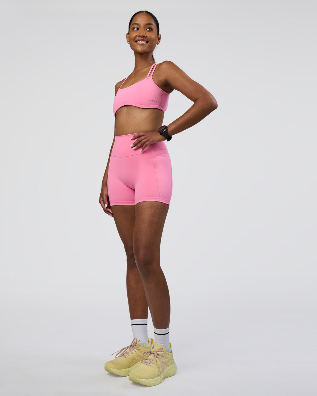 Woman wearing Interstellar Sports Bra - Candy Pink | Model:Rica | Size:S