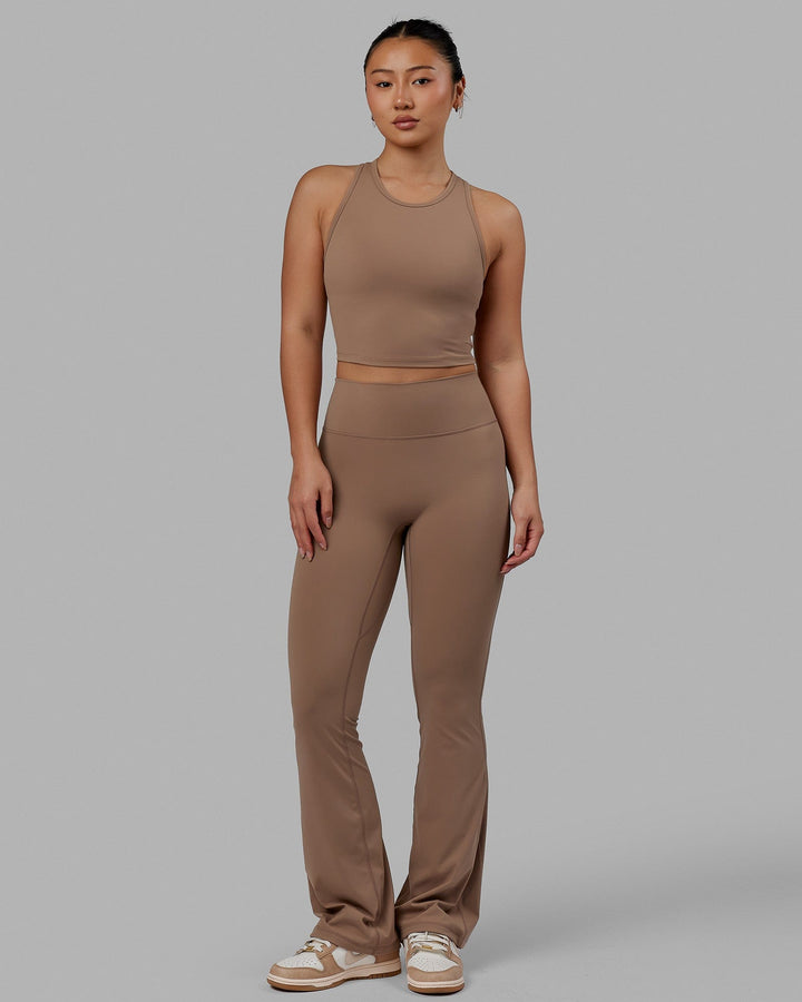 Woman wearing LHFM Tank - Doe