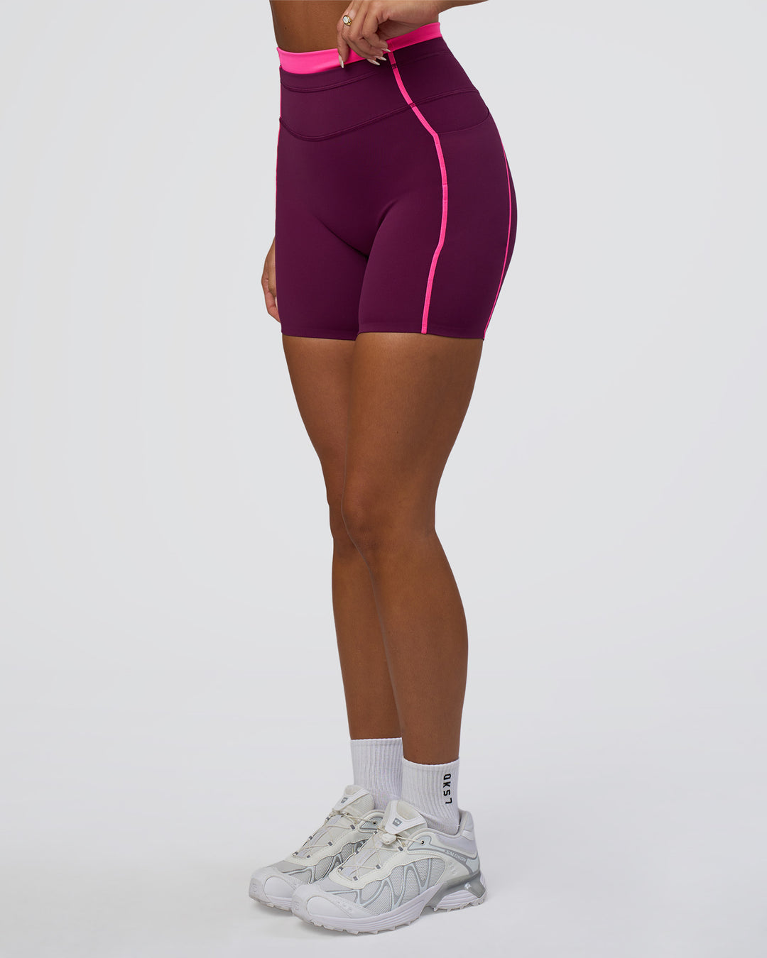 Woman wearing Liberate Contrast High-Rise 6&quot; Short Pockets - Plum Caspia-Ultra Pink | Model:Bianca | Size:S