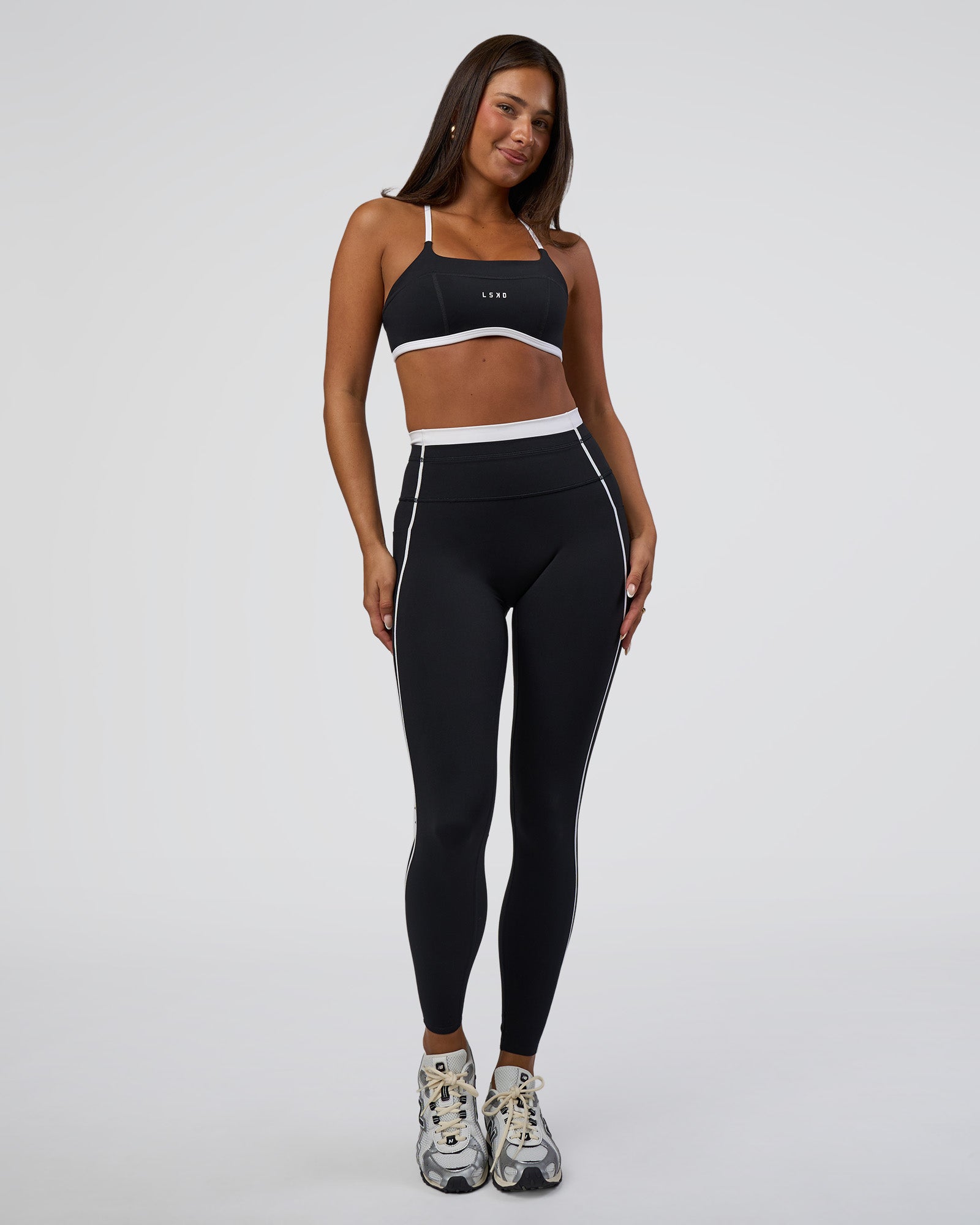 Woman wearing Liberate Contrast High-Rise Full Length Legging Pockets - Black-White | Model:Bianca | Size:S