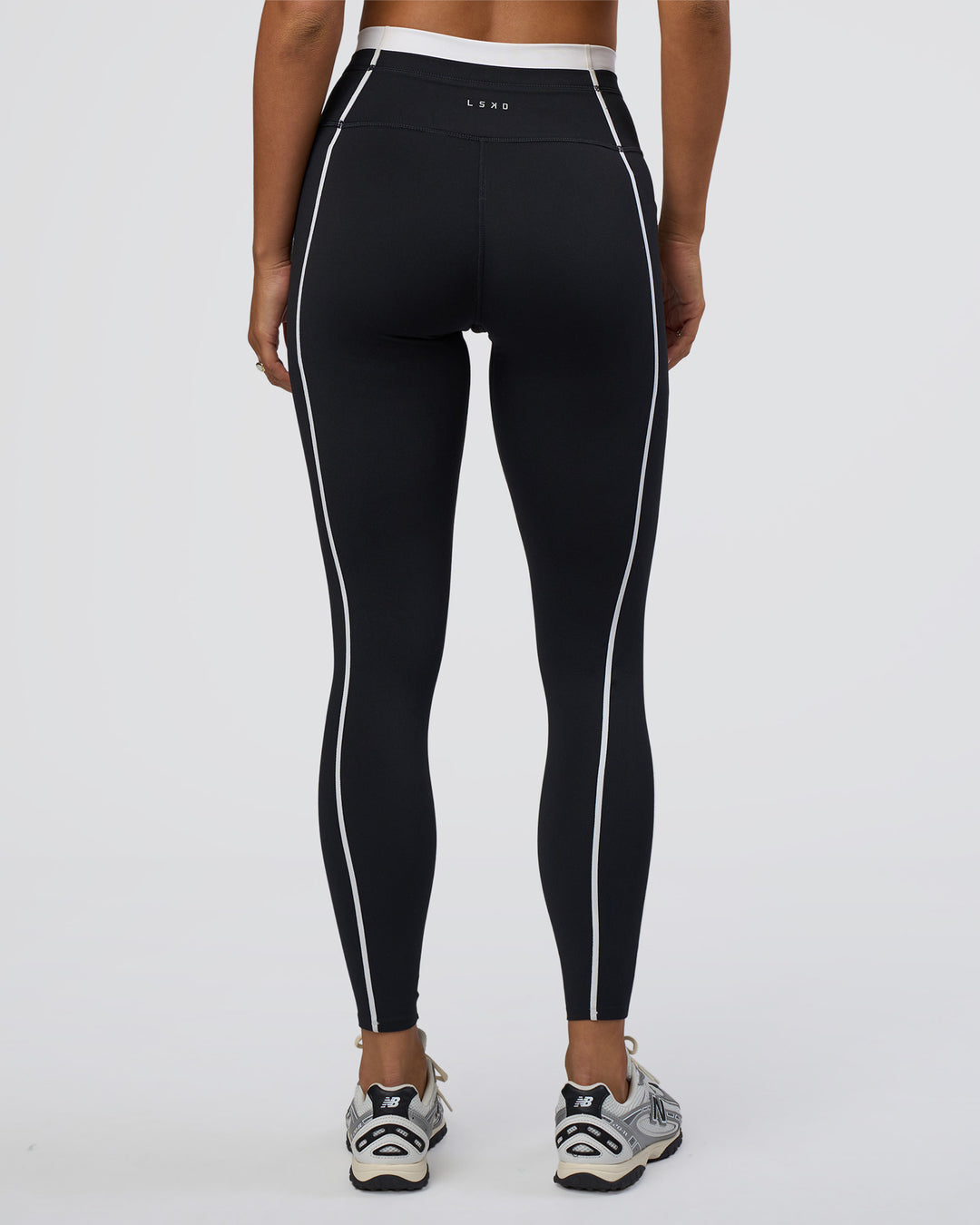 Woman wearing Liberate Contrast High-Rise Full Length Legging Pockets - Black-White | Model:Bianca | Size:S