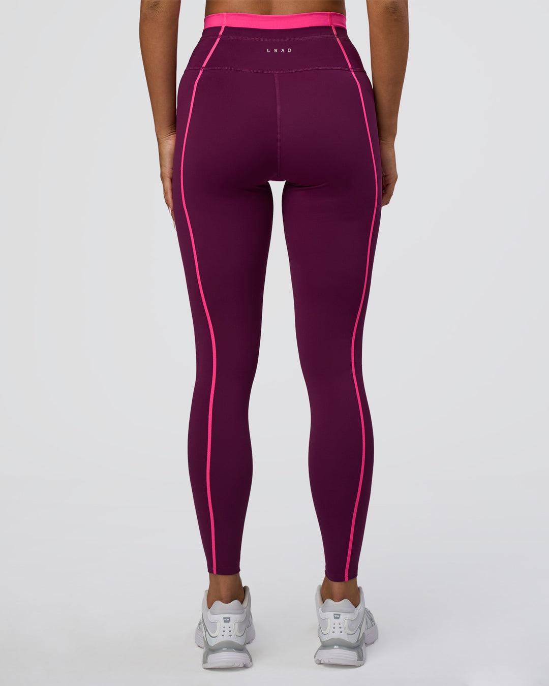 Woman wearing Liberate Contrast High-Rise Full Length Legging Pockets - Plum Caspia-Ultra Pink | Model:Bianca | Size:S