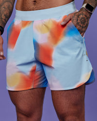 Model wearing Lift 6" Short - Rainbow Shade Print | Model:Tayden | Size:S
