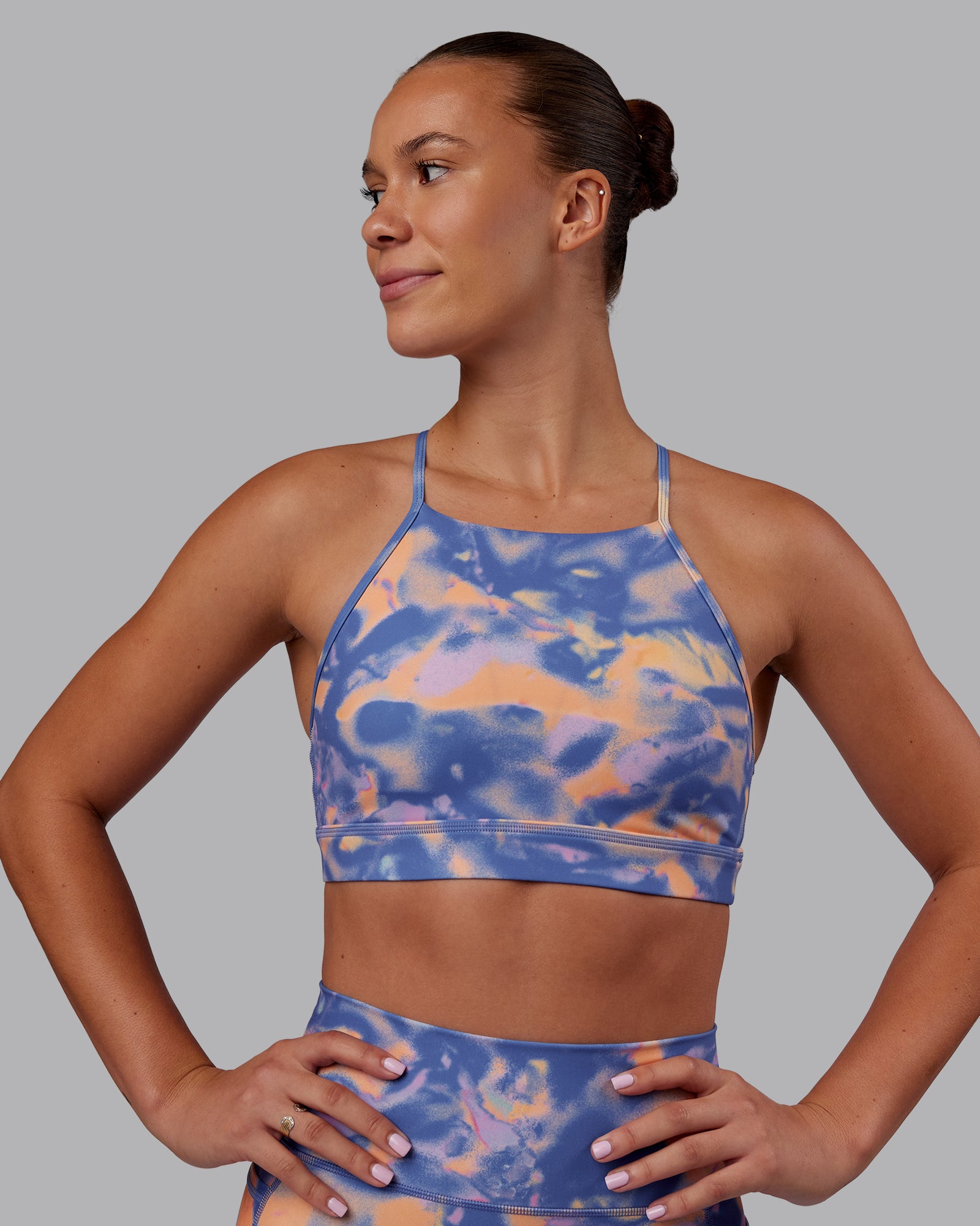 Woman wearing Lift High Neck Sports Bra - Apricot Mist | Model:Charlize | Size:S