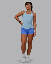 Woman wearing Lift Performance Tank - Glacial Blue