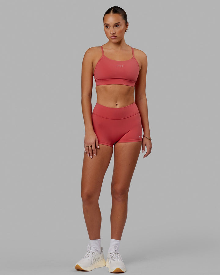 Woman wearing Lift Sports Bra - Mineral Red