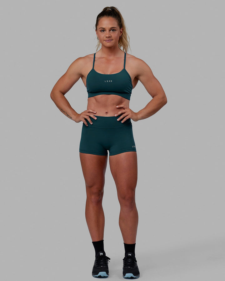 Woman wearing Lift Sports Bra - Tidal Teal
