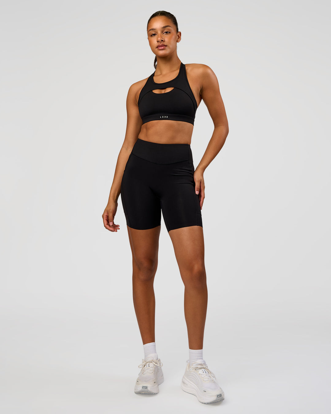 Woman wearing LimitLift Sports Bra - Black | Model:Rosie | Size:S