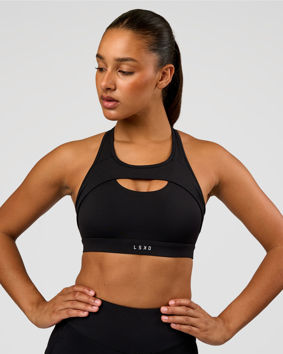 Woman wearing LimitLift Sports Bra - Black | Model:Rosie | Size:S