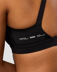 Woman wearing LimitLift Sports Bra - Black | Model:Rosie | Size:S