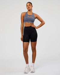 Woman wearing LimitLift Sports Bra - Night Shadow | Model:Rosie | Size:S