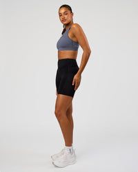 Woman wearing LimitLift Sports Bra - Night Shadow | Model:Rosie | Size:S